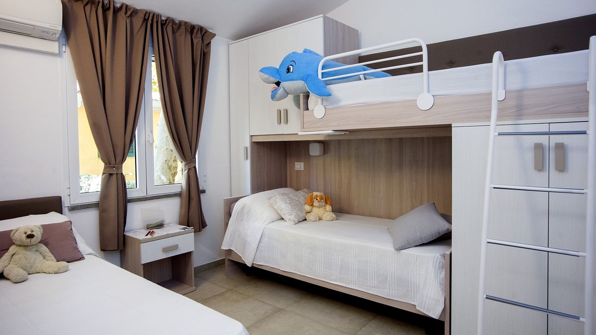  Cameretta Deluxe Plus - Camping Village Baia Azzurra  a  Castiglione della Pescaia 