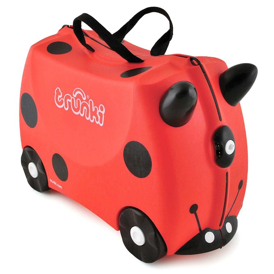 Bambini in viaggio con valigia cavalcabile Trunki